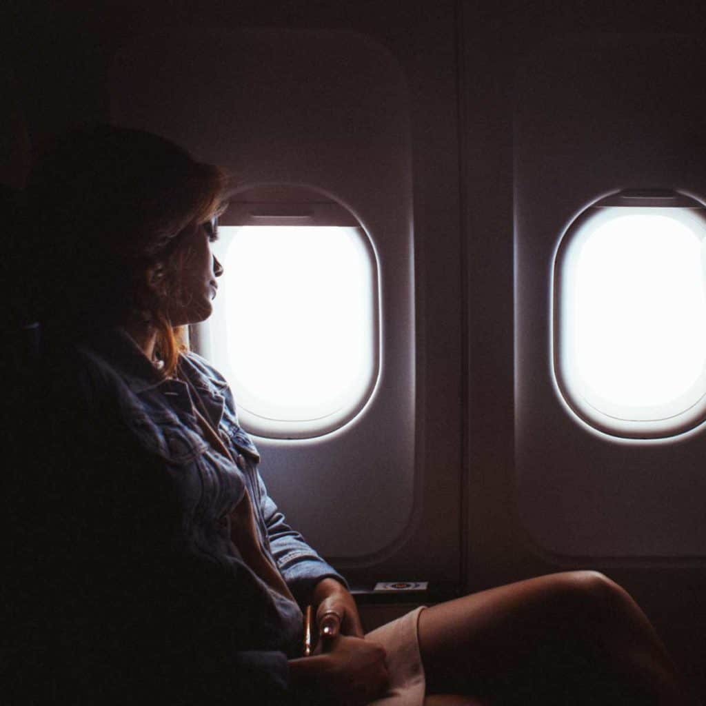 How to sleep on a plane in economy class - My top tips 1 Window seats are best