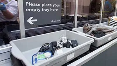 what to put in tray at airport security