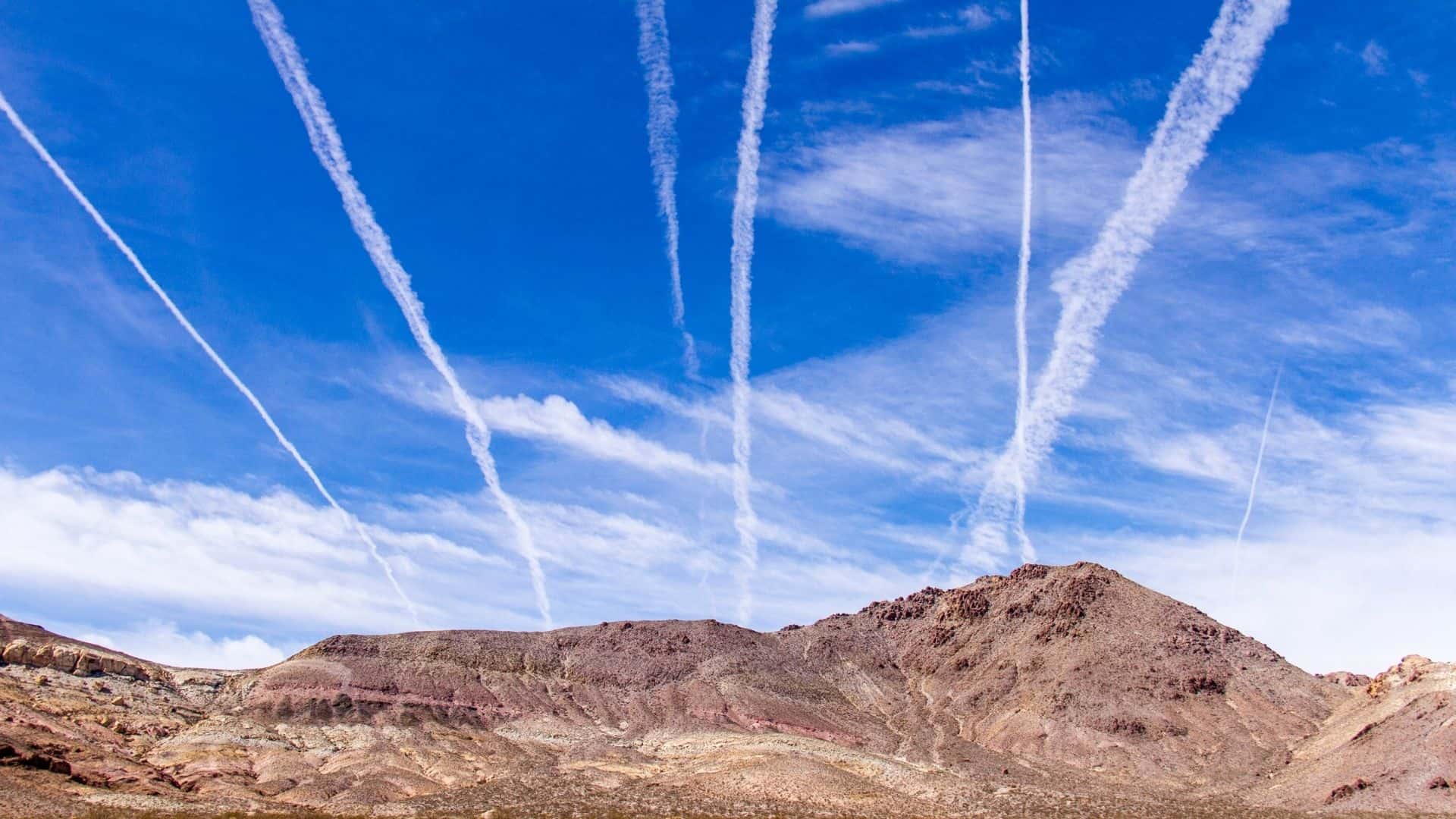Why do planes leave trails