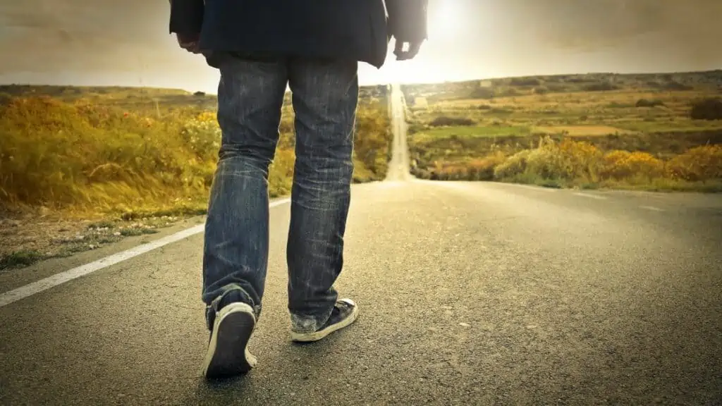 Man walking on the road_How Long Does It Take To Fly Around The World
