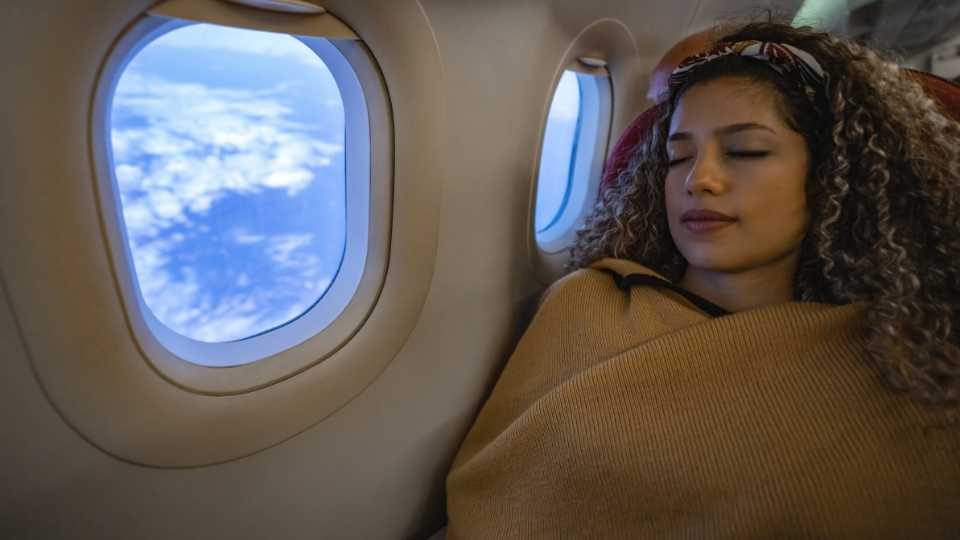 sleep on a plane - use a blanket
