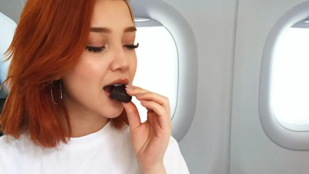 Can You Bring Chocolate On A Plane_Eating chocolates while on board