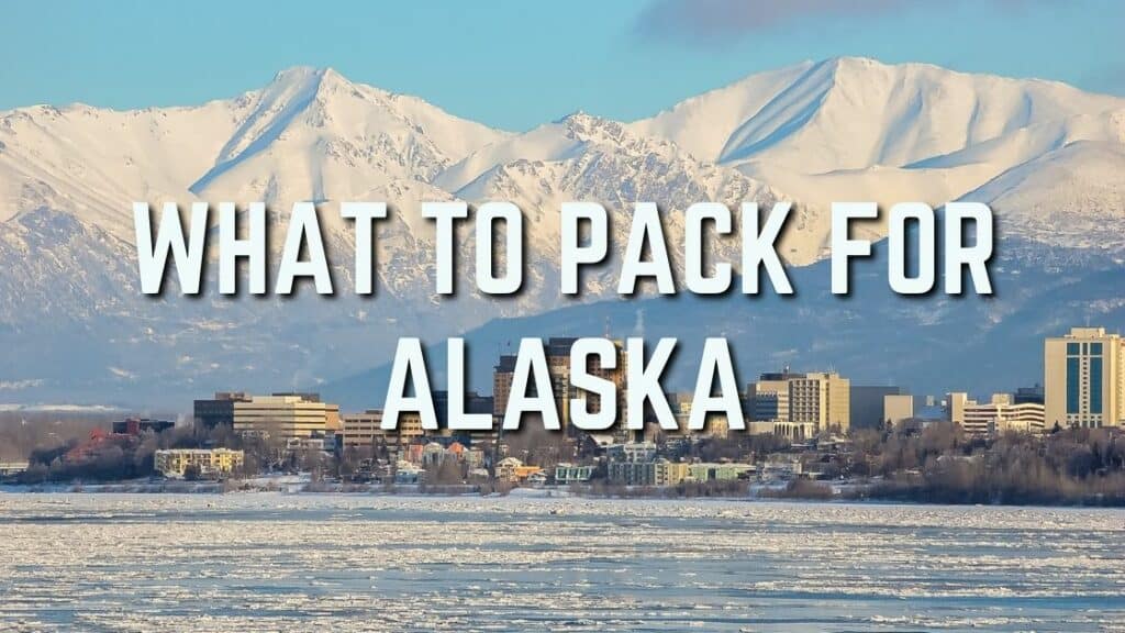 Image of maountain and sea in Alaska with text overlays taht read What To Pack For Alaska